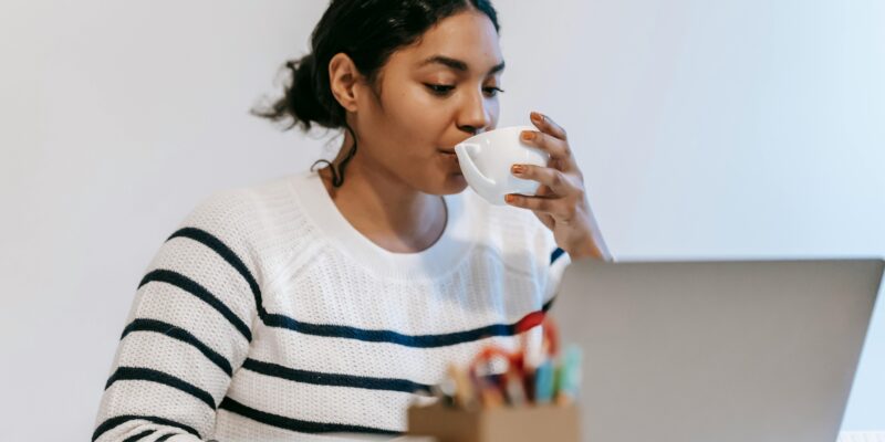 Woman working on laptop at desk