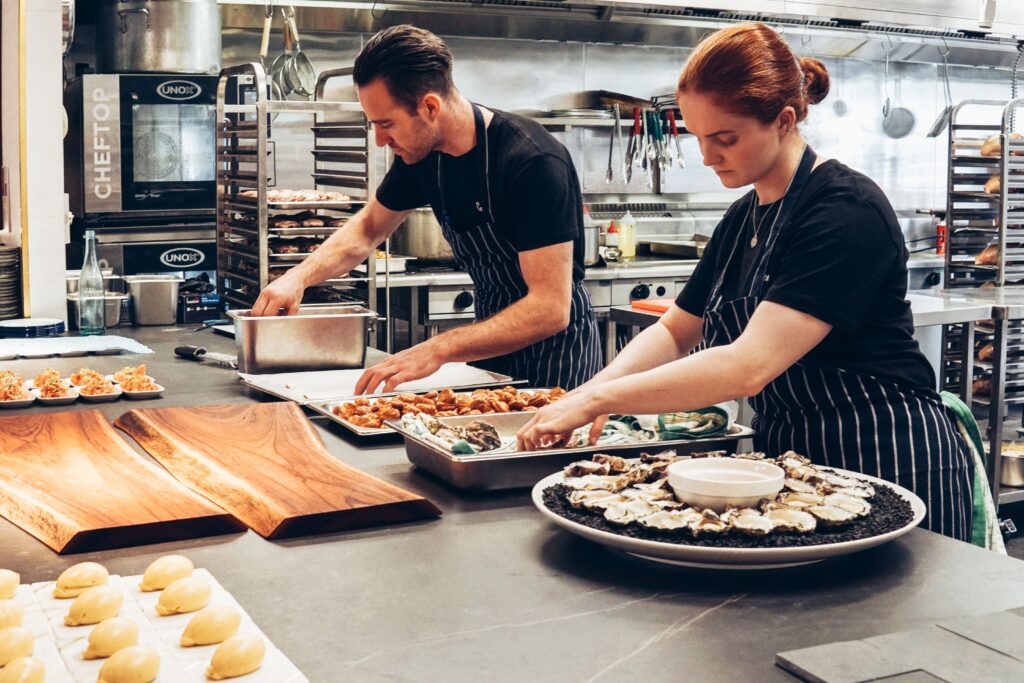 Chefs working in commercial kitchen