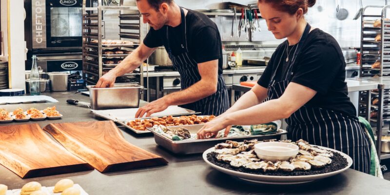 Chefs working in commercial kitchen
